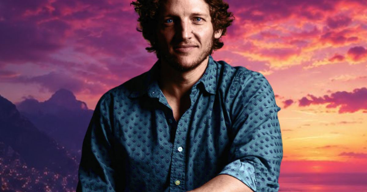 Logan Crowell, Veda Build co-founder, against a vivid sunset landscape